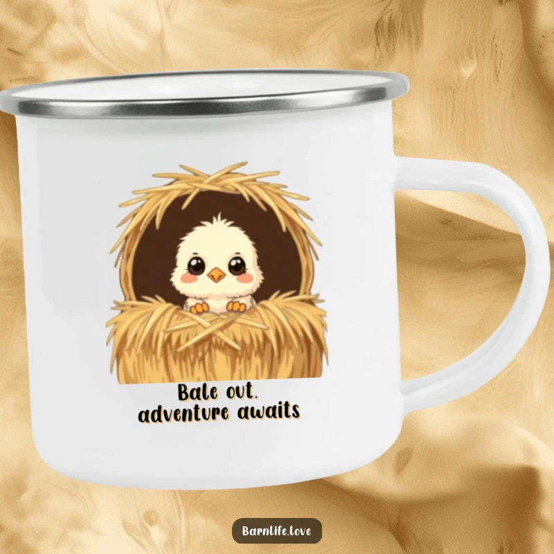 Funny Camping Mug showcasing a fluffy chick peeking from a straw bale, ideal for humorous outdoor coffee or tea breaks.