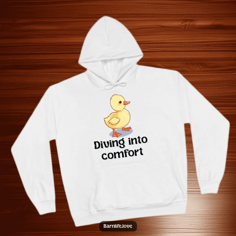 Funny Hoodie featuring a curious duckling waddling towards a shiny water trough, a cozy and humorous farm animal apparel choice.