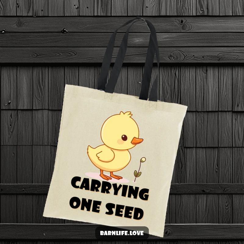 Funny duckling waddling tote bag showing a cheerful baby duck with a tiny seed, perfect for carrying essentials.